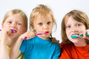 Children brushing teeth